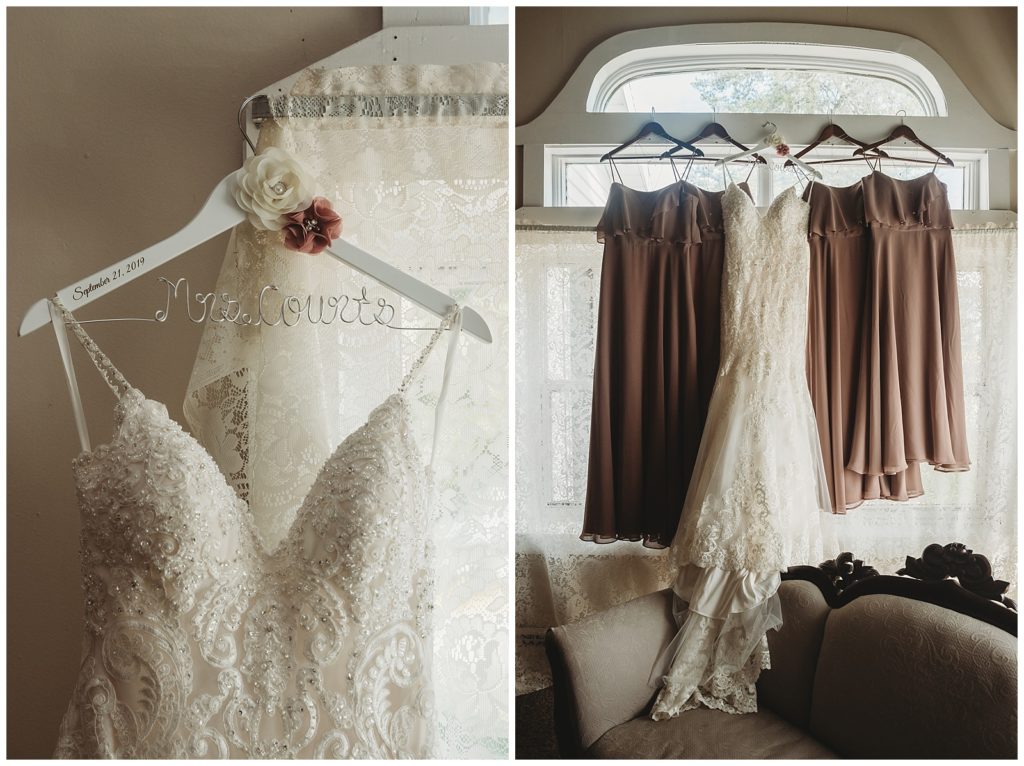 Bridal dresses hanging from window