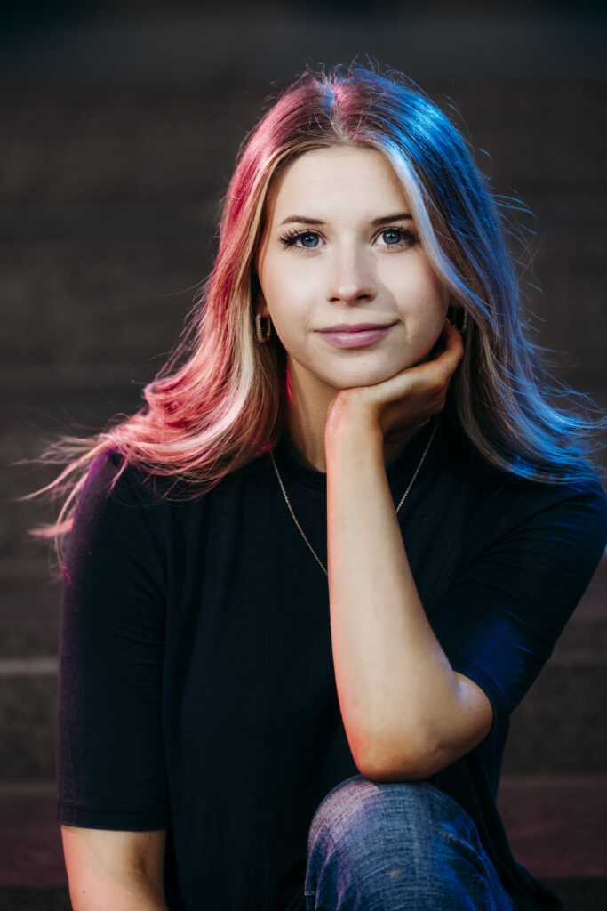 colorful senior photo in downtown grand rapids
